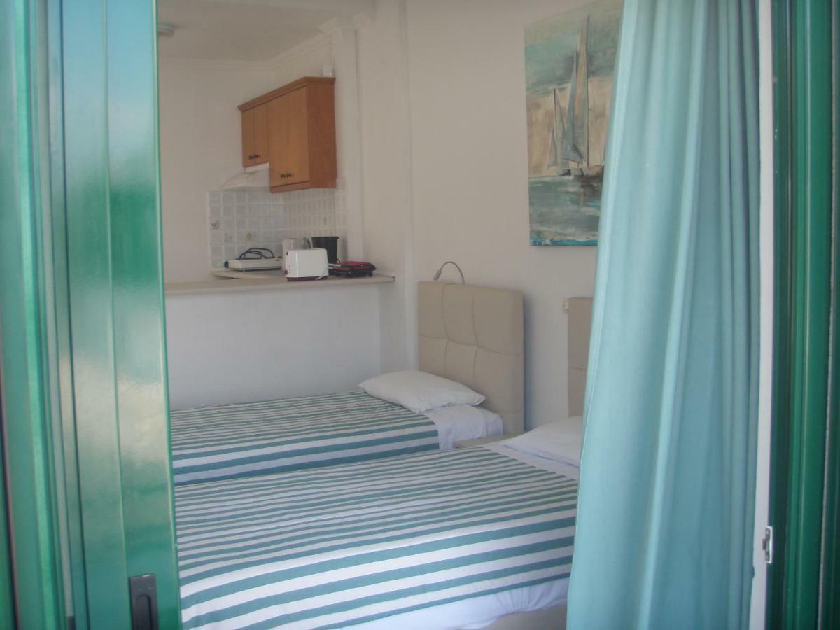 Umbrella Beach Apartments Kavos Exterior photo