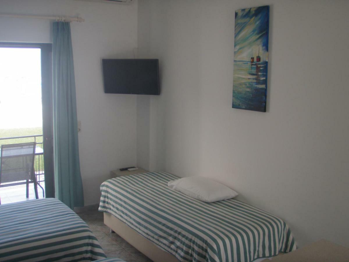 Umbrella Beach Apartments Kavos Exterior photo